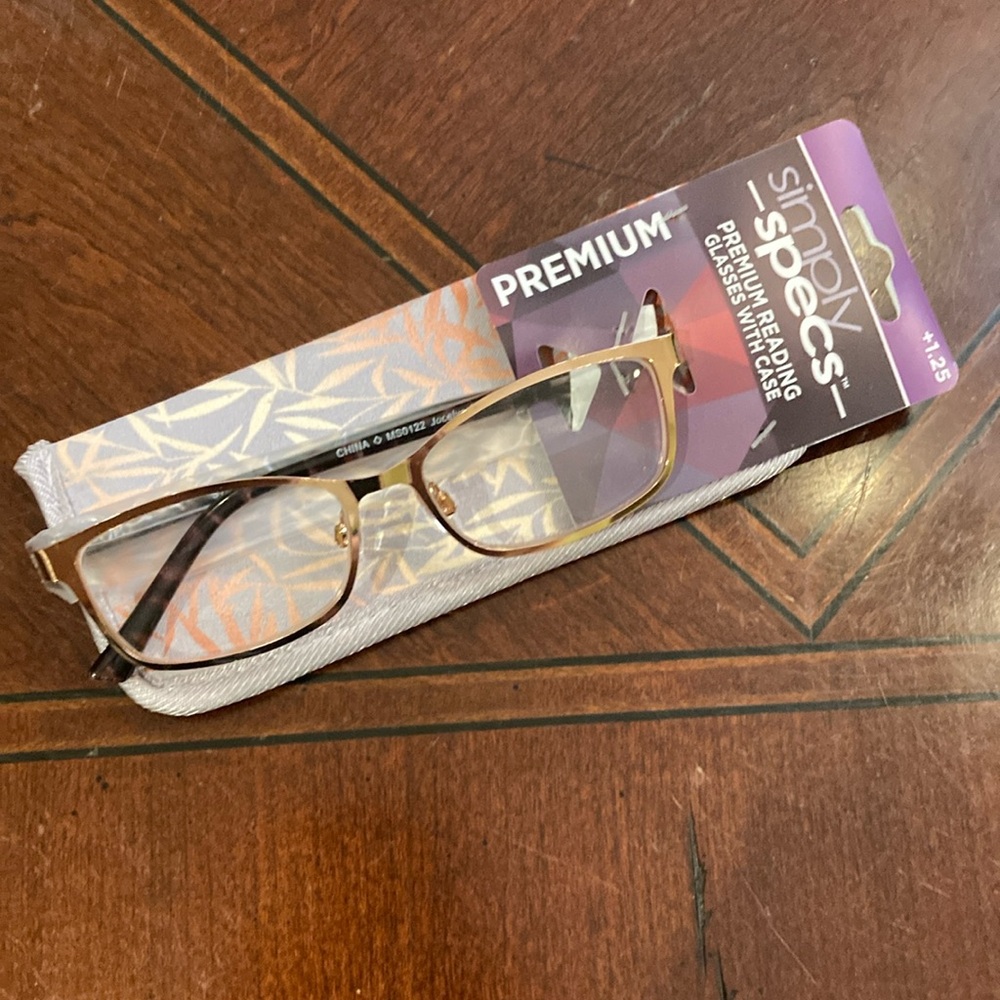 Simply Specs reading glasses and coordinating case. New with tags.